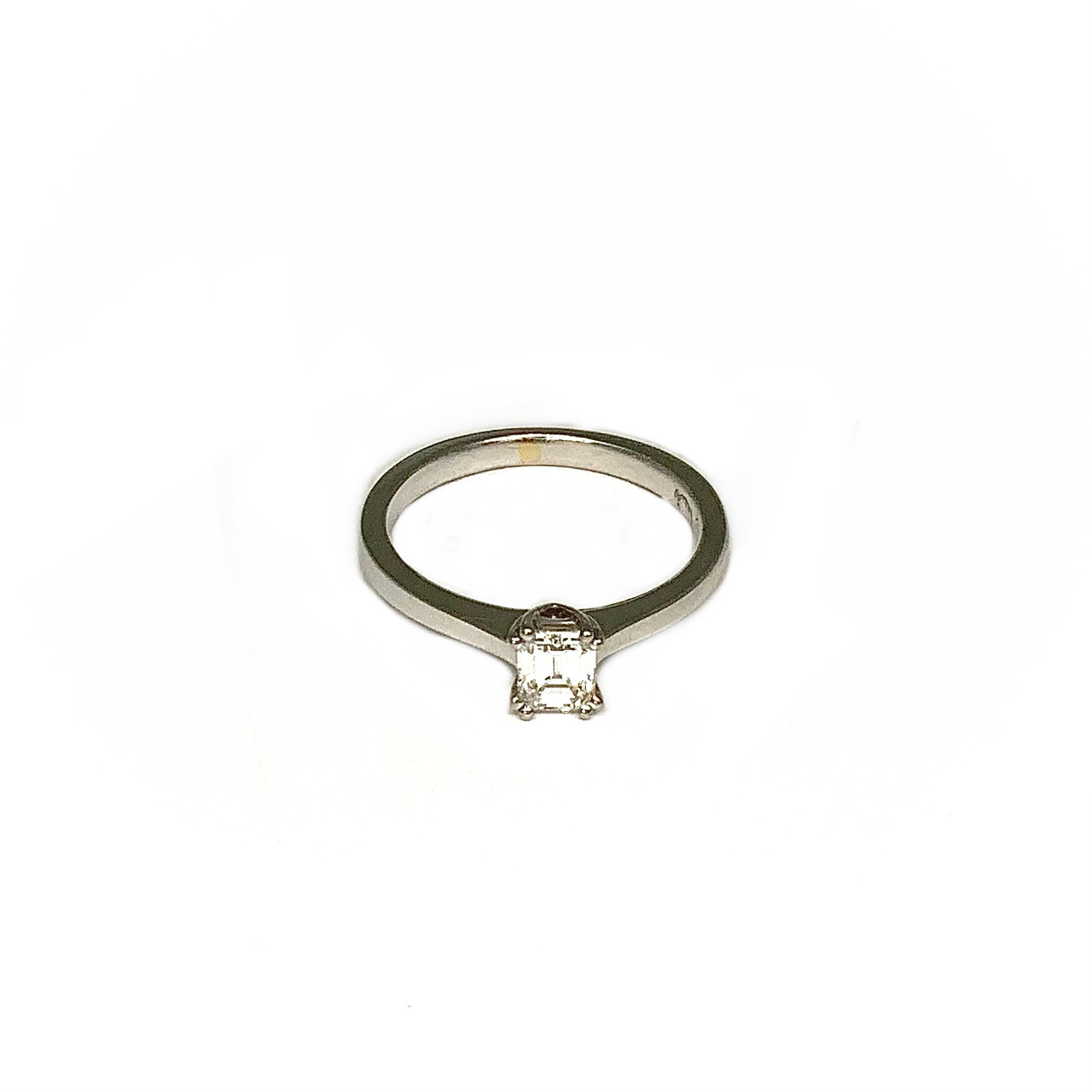 white gold emerald cut diamond ring