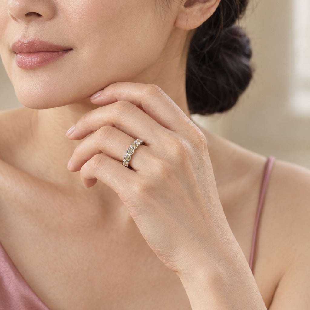 Model wearing the Lesunja White Gold Yellow-Green Diamond Eternity Ring by Lesunja Fine Jewellery – AI-generated visualisation