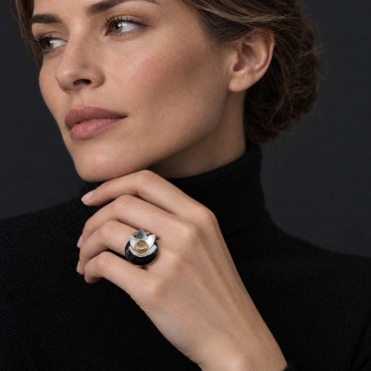 Model wearing the Lesunja Silver And Gold Lotus Ring by Lesunja Fine Jewellery – AI-generated visualisation