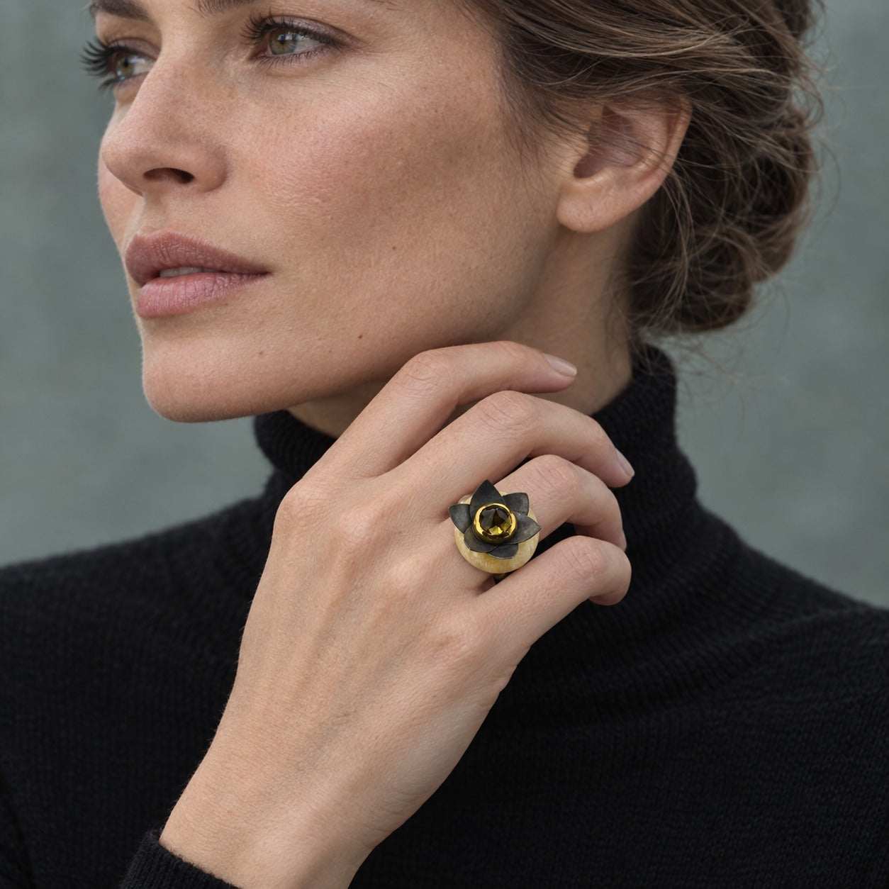 Model wearing the Lesunja Lotus Silver Yellow Gold Quartz Citrine Ring by Lesunja Fine Jewellery – AI-generated visualisation