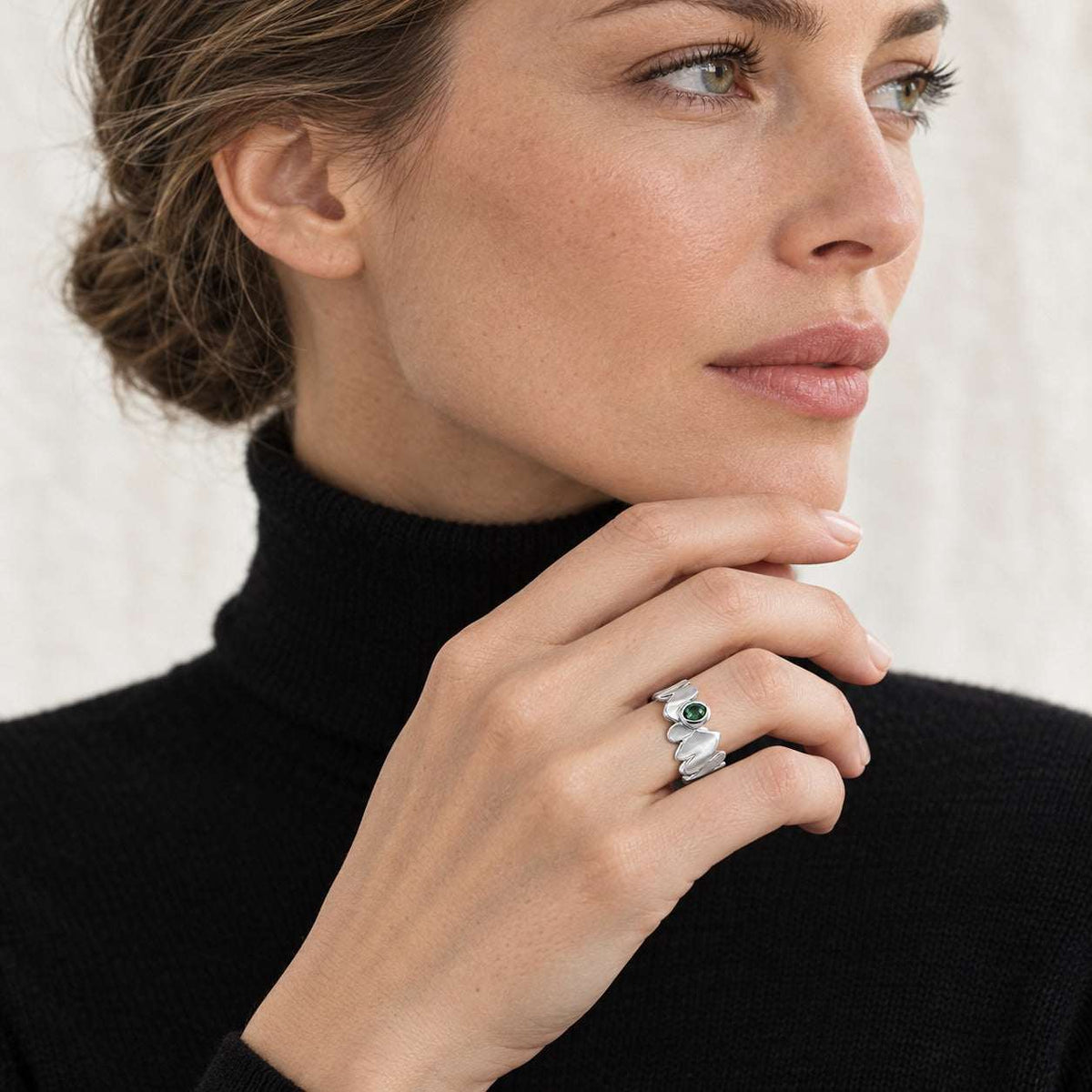 Model wearing the Lesunja Three Of Hearts Silver Ring by Lesunja Fine Jewellery – AI-generated visualisation