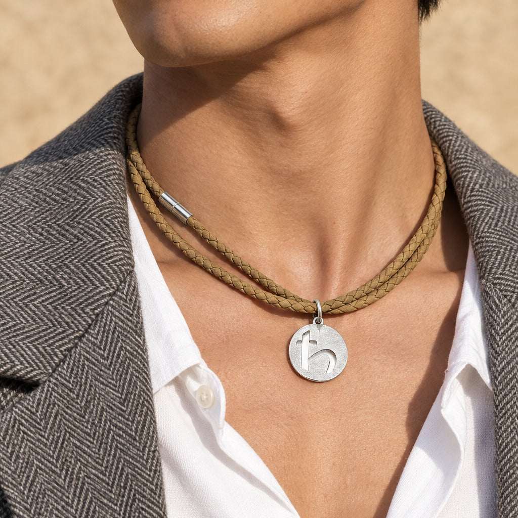 Model wearing the Lesunja Saturn Leather and Silver Necklace by Lesunja Fine Jewellery – AI-generated visualisation