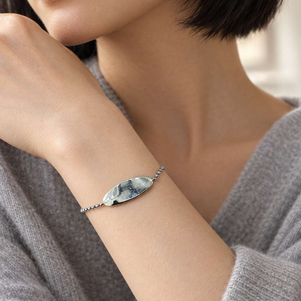 Model wearing the Lesunja Baby Silver Bracelet by Lesunja Fine Jewellery – AI-generated visualisation