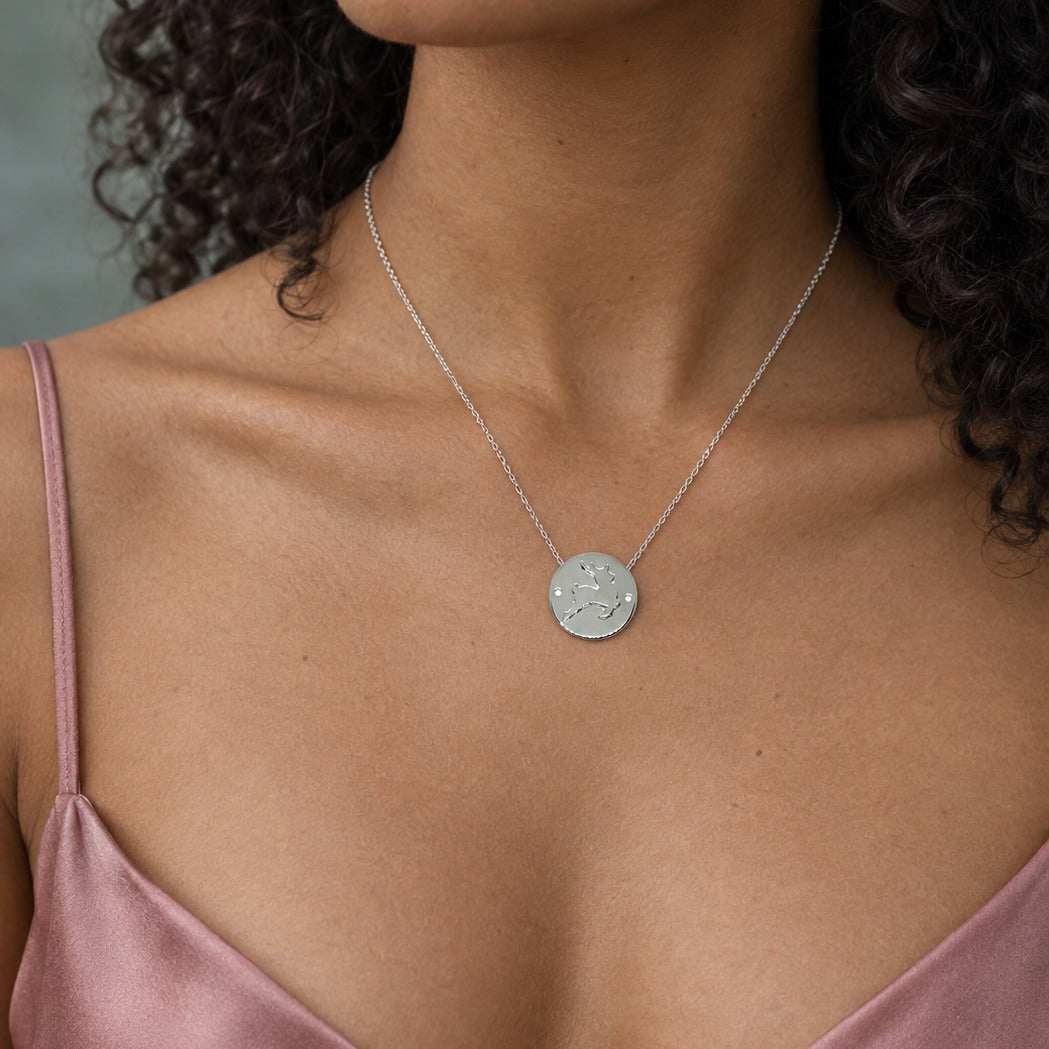 Model wearing the Lesunja Little Reindeer Silver Pendant by Lesunja Fine Jewellery – AI-generated visualisation