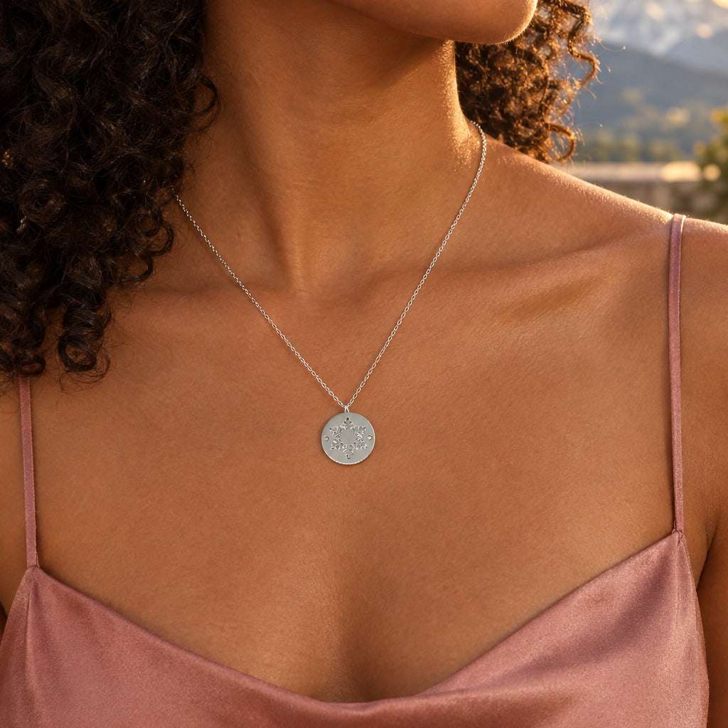 Model wearing the Lesunja Little Snowflake Silver Pendant by Lesunja Fine Jewellery – AI-generated visualisation