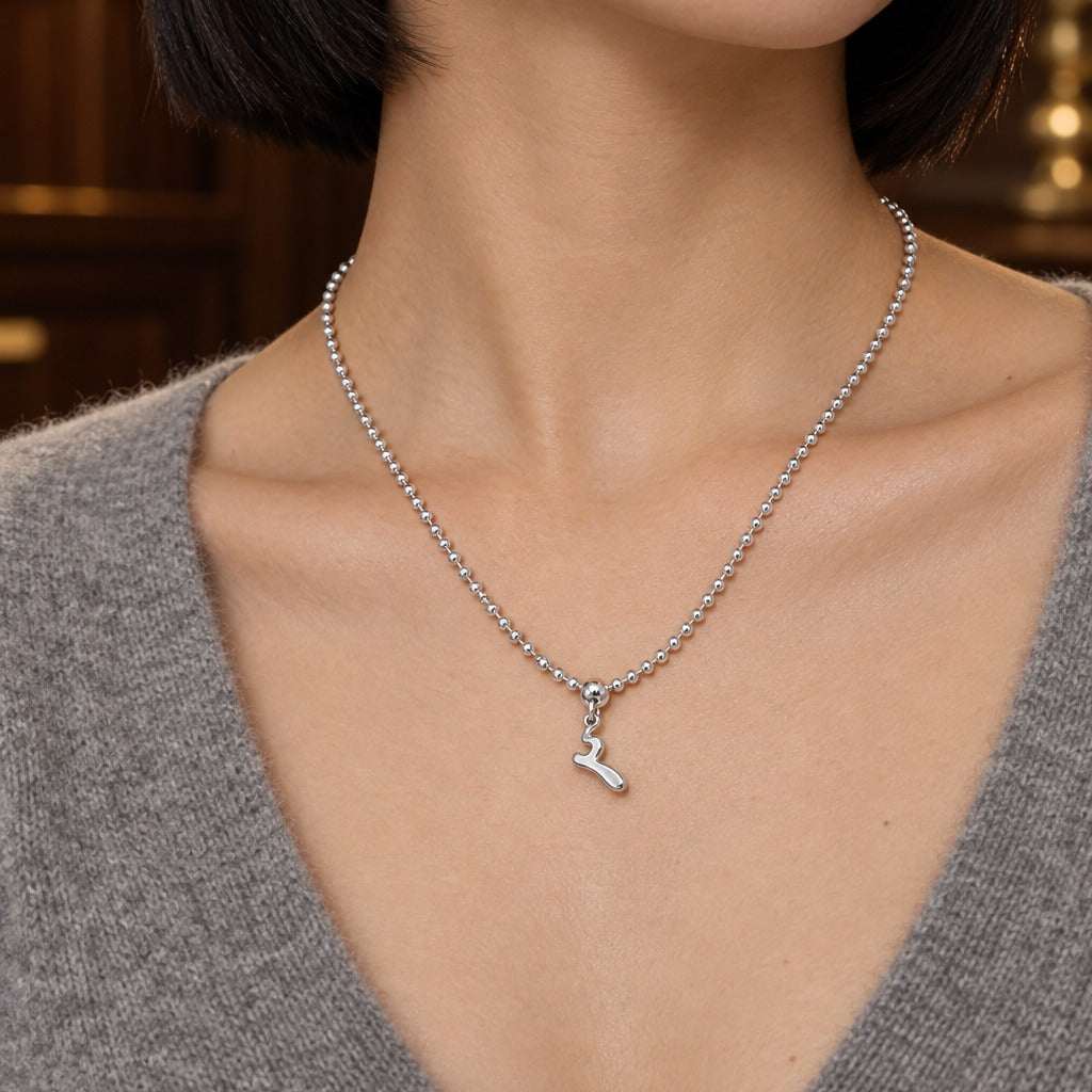 Model wearing the Lesunja Ballerinas Midnight Dance Silver Pendant by Lesunja Fine Jewellery – AI-generated visualisation