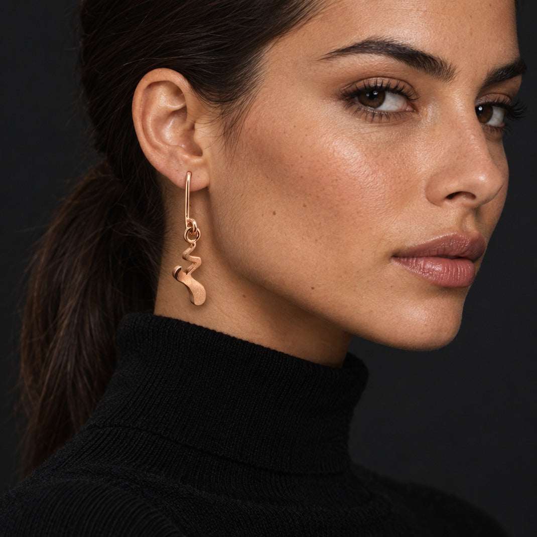 Model wearing the Lesunja Ballerinas: The Last Dance Silver Rose Gold Plated Hangers by Lesunja Fine Jewellery – AI-generated visualisation