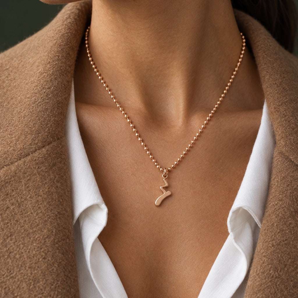 Model wearing the Lesunja Ballerinas Let`s go dancing Silver Rose Gold Plated Pendant by Lesunja Fine Jewellery – AI-generated visualisation