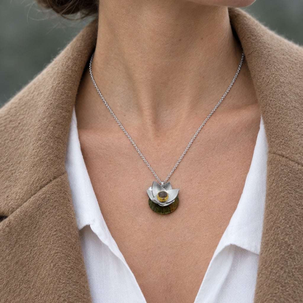Model wearing the Lesunja Lotus Silver Pendant by Lesunja Fine Jewellery – AI-generated visualisation