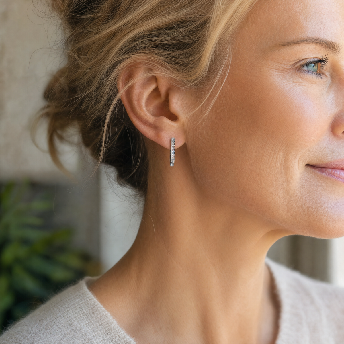 Model wearing the Lesunja Creoles Platinum Light Blue Topaz Earrings
