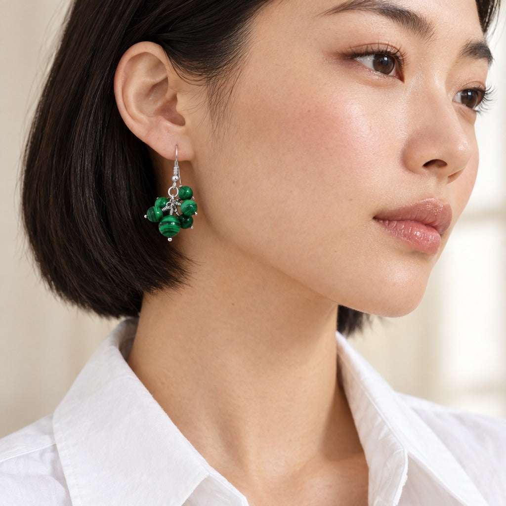Model wearing the Lesunja Sterling Silver Malachite Earrings by Lesunja Fine Jewellery – AI-generated visualisation