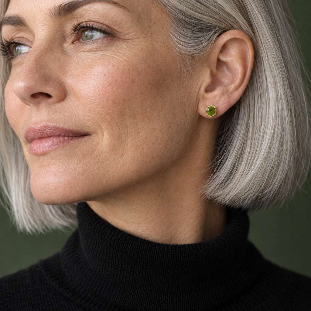 Model wearing the Lesunja La vie Ear Studs Yellow Gold Peridot by Lesunja Fine Jewellery – AI-generated visualisation