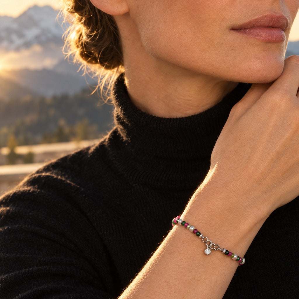 Model wearing the Lesunja Bracelet White Gold Pearl, Ruby & Jade Beads by Lesunja Fine Jewellery – AI-generated visualisation