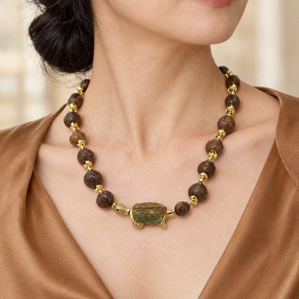 Model wearing the Lesunja Necklace Yellow Gold Jade Turtle Diamonds Brown Snail Pearls by Lesunja Fine Jewellery – AI-generated visualisation