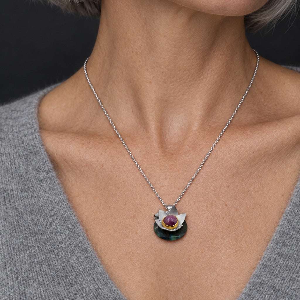 Model wearing the Lesunja Lotus Iris Silver Pendant by Lesunja Fine Jewellery – AI-generated visualisation