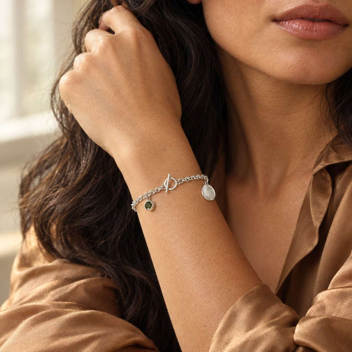 Model wearing the Lesunja Silver Bracelet Green Tourmaline by Lesunja Fine Jewellery – AI-generated visualisation