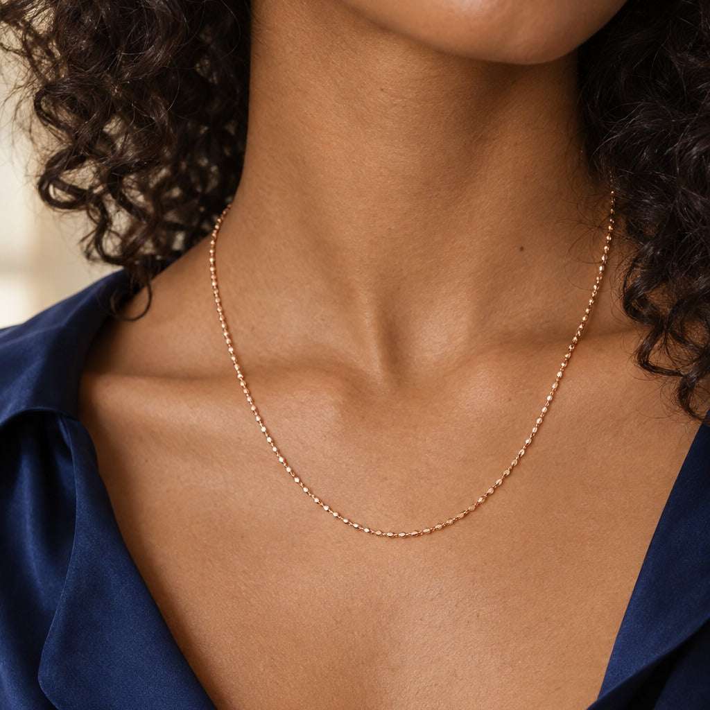 Model wearing the Lesunja Sweet Present Rose Gold Plated Achor Chain by Lesunja Fine Jewellery – AI-generated visualisation