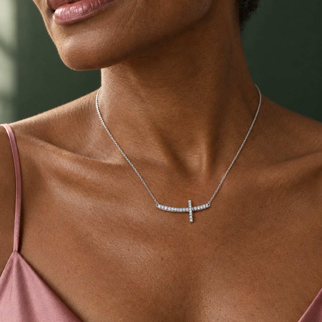 Model wearing the Lesunja White Gold and Diamond Cross Necklace by Lesunja Fine Jewellery – AI-generated visualisation