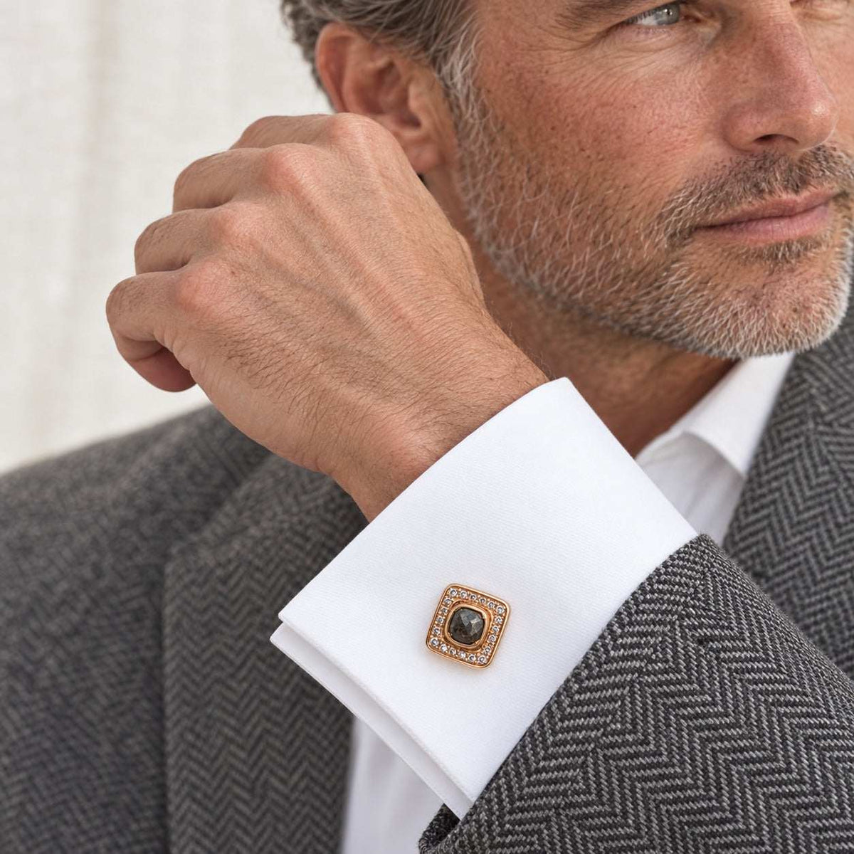 Model wearing the Lesunja Rose Gold Diamonds Cufflinks by Lesunja Fine Jewellery – AI-generated visualisation