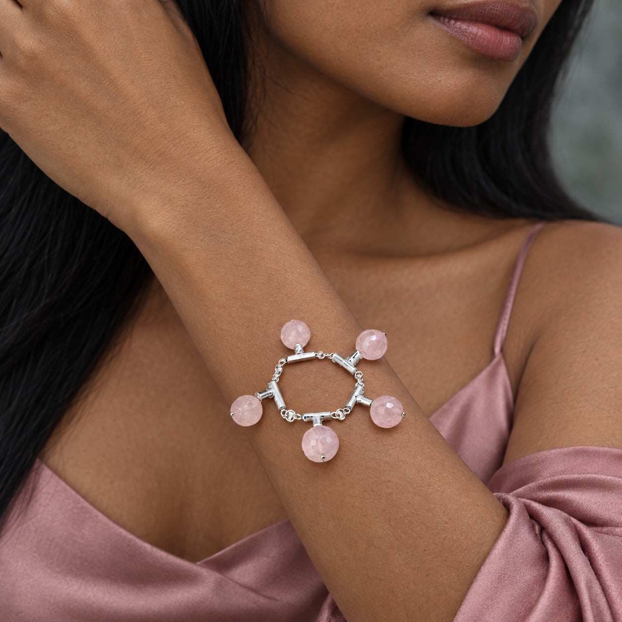 Model wearing the Lesunja Rose Quartz Silver Bracelet by Lesunja Fine Jewellery – AI-generated visualisation