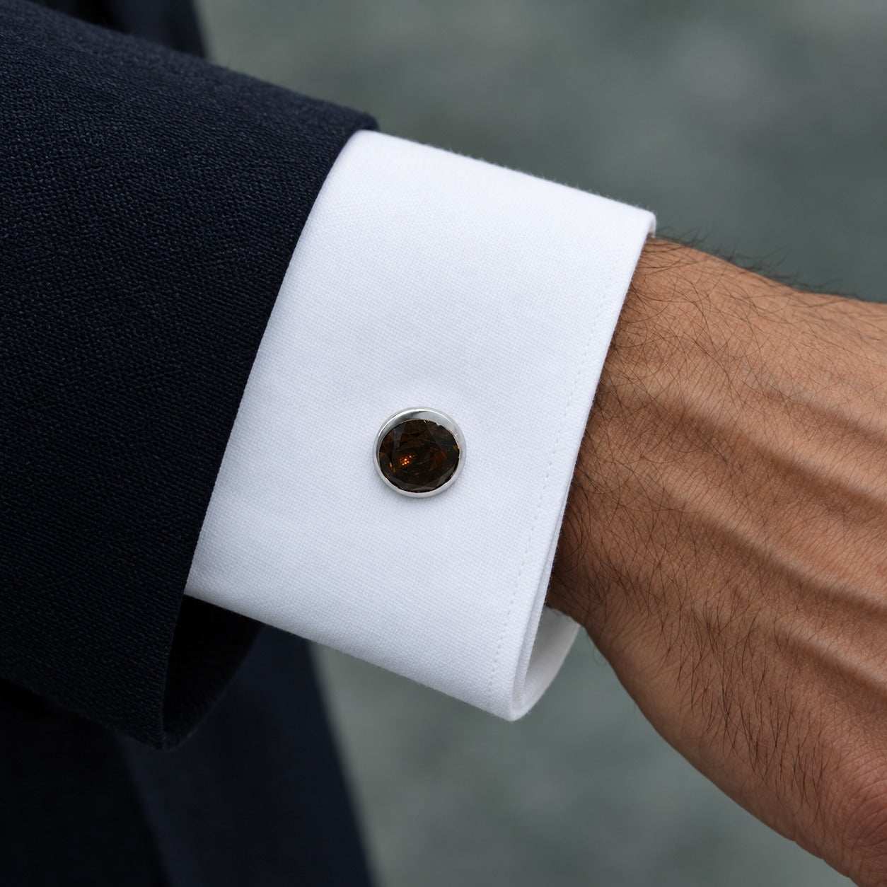 Model wearing the Lesunja Cufflinks Silver Brown Smoky Quartz by Lesunja Fine Jewellery – AI-generated visualisation