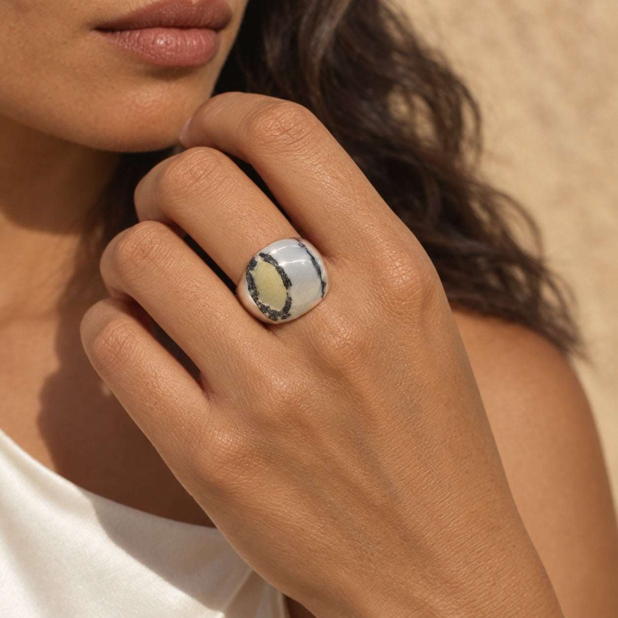 Model wearing the Lesunja Swiss Stone Ring by Lesunja Fine Jewellery – AI-generated visualisation