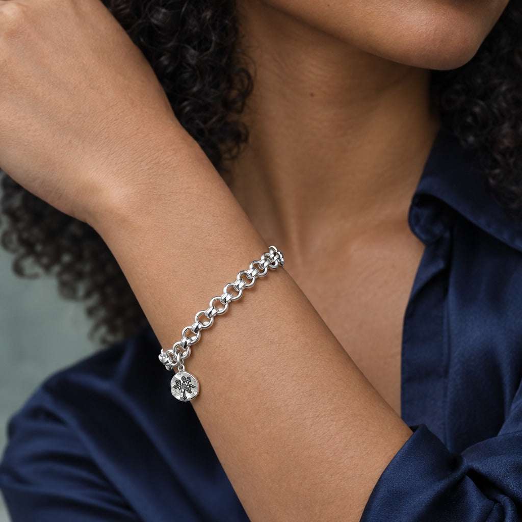 Model wearing the Lesunja Gemini Zodiac Bracelet by Lesunja Fine Jewellery – AI-generated visualisation