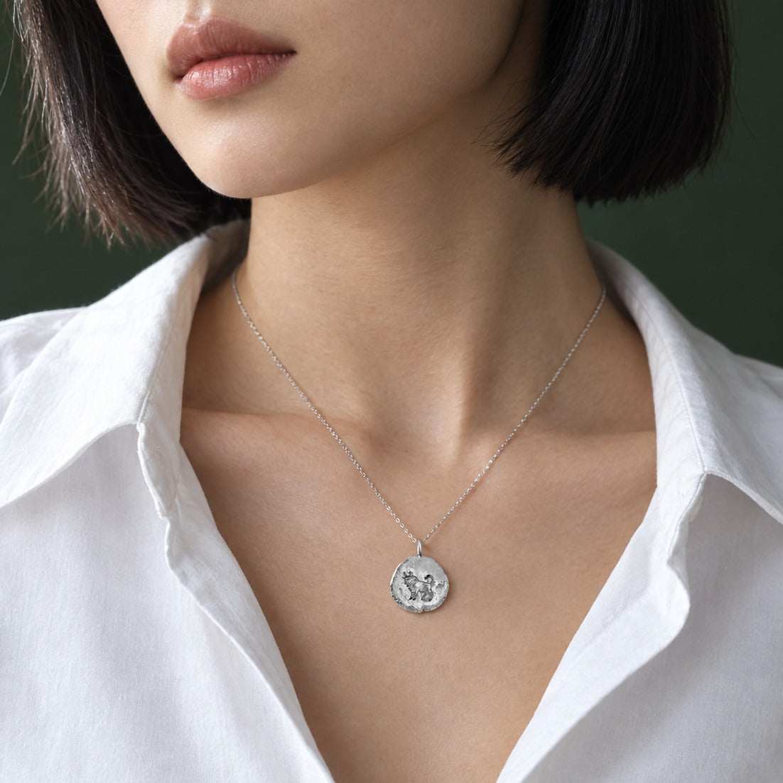 Model wearing the Lesunja Zodiac Taurus Pendant by Lesunja Fine Jewellery – AI-generated visualisation