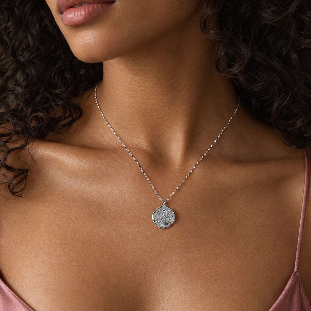 Model wearing the Lesunja Zodiac Aquarius Necklace Silver by Lesunja Fine Jewellery – AI-generated visualisation