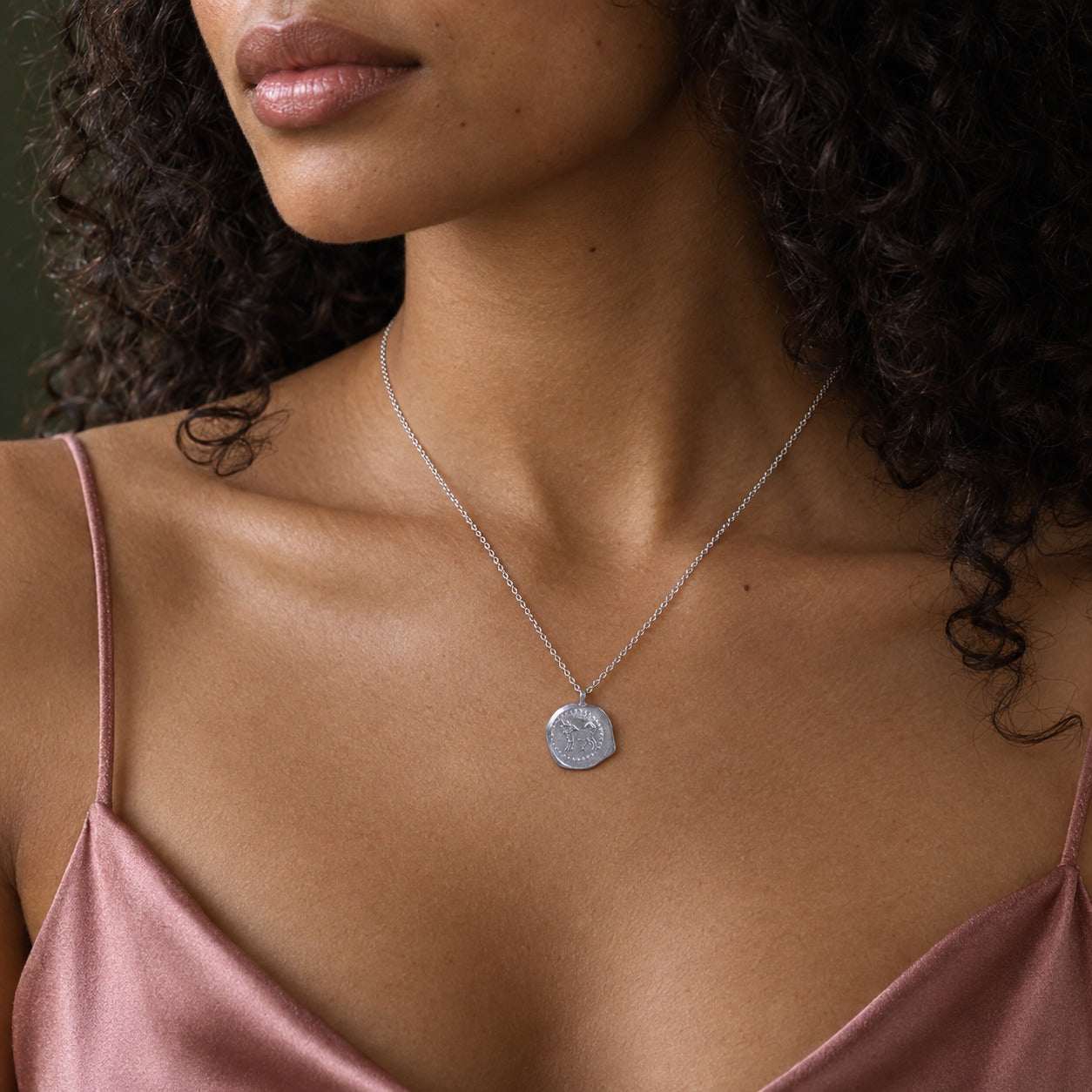 Model wearing the Lesunja Zodiac Taurus Silver Necklace by Lesunja Fine Jewellery – AI-generated visualisation