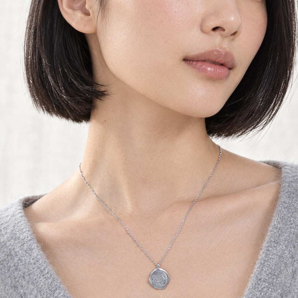 Model wearing the Lesunja Zodiac Virgo Silver Necklace by Lesunja Fine Jewellery – AI-generated visualisation