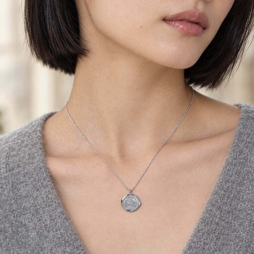 Model wearing the Lesunja Zodiac Cancer Silver Necklace Matt by Lesunja Fine Jewellery – AI-generated visualisation