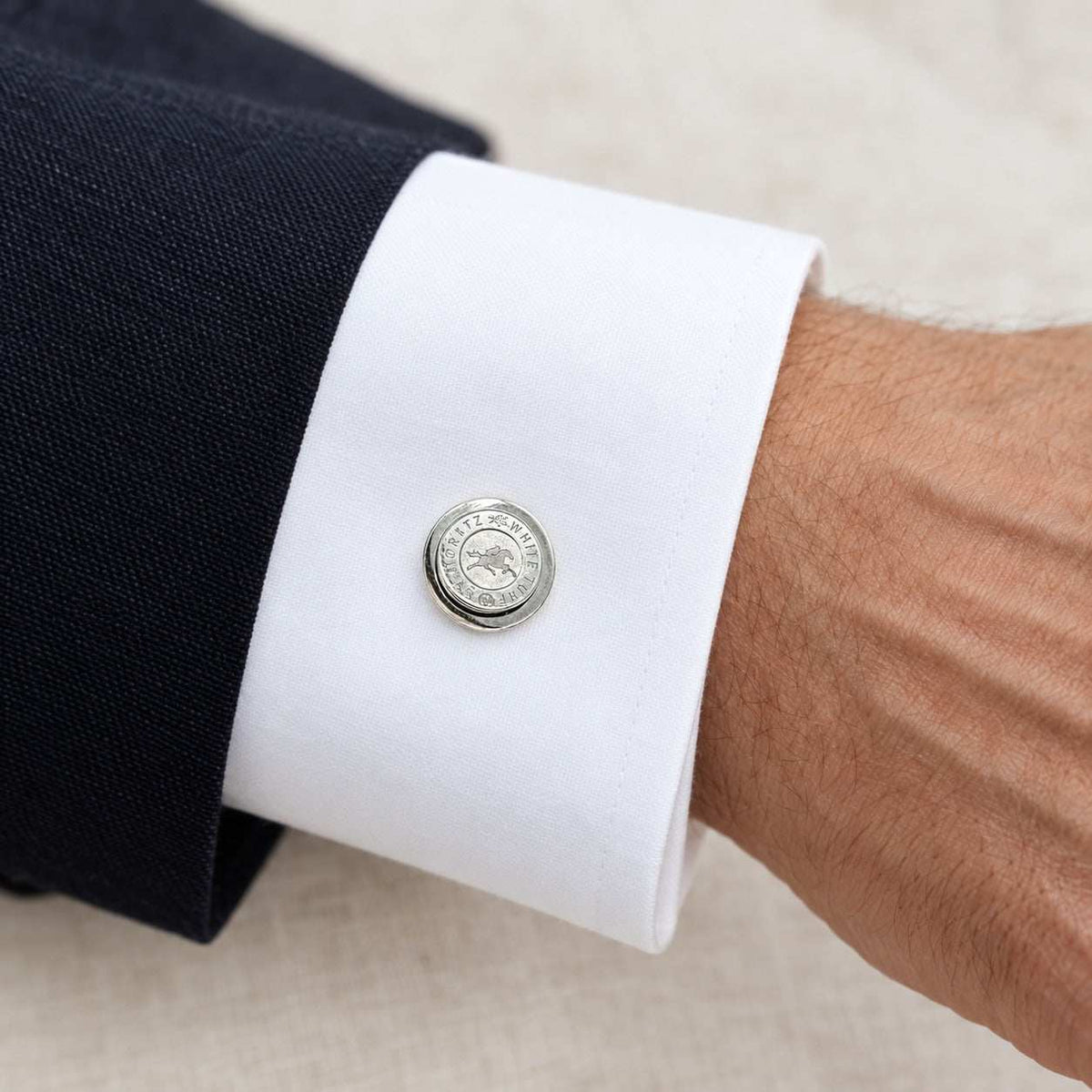 Model wearing the Lesunja St. Moritz White Turf Cufflinks by Lesunja Fine Jewellery – AI-generated visualisation