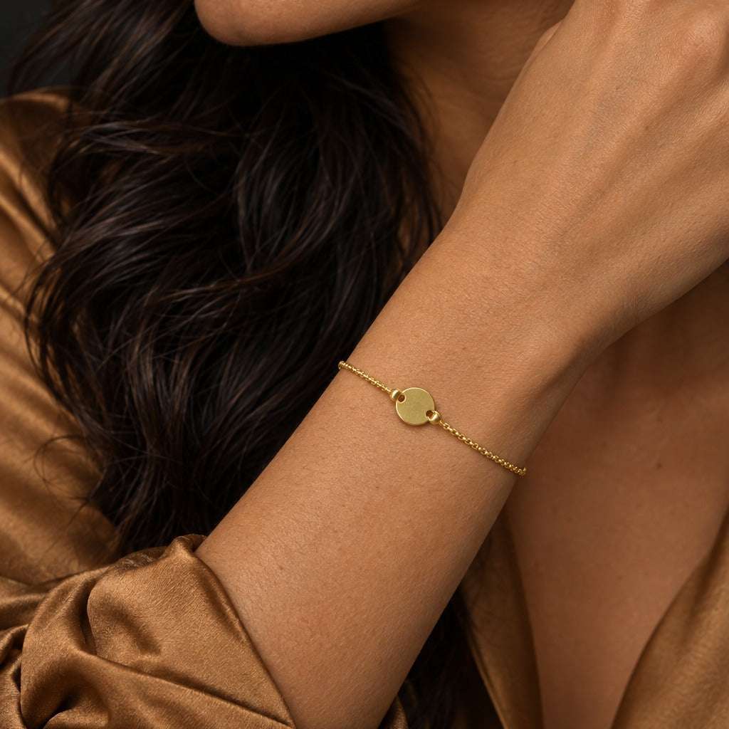 Model wearing the Lesunja Yellow Gold Anchor Chain Bracelet by Lesunja Fine Jewellery – AI-generated visualisation