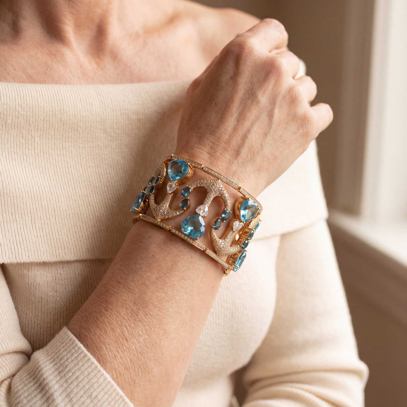 Model wearing the Lesunja Accor Gold Bracelet Yellow Gold Topaz