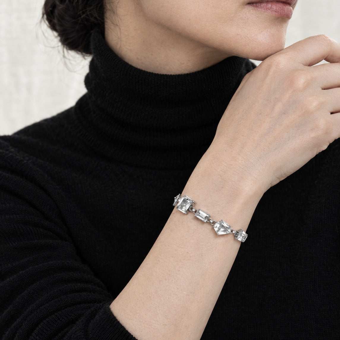 Model wearing the Lesunja Hidden Secrets Topaz White Platinum Bracelet by Lesunja Fine Jewellery – AI-generated visualisation