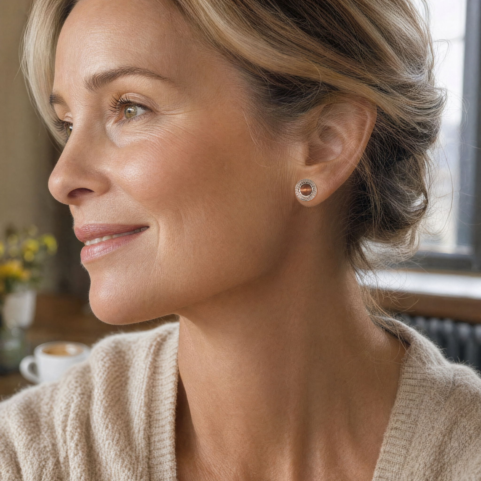 Model wearing the Lesunja Usually Different Silver Earclips