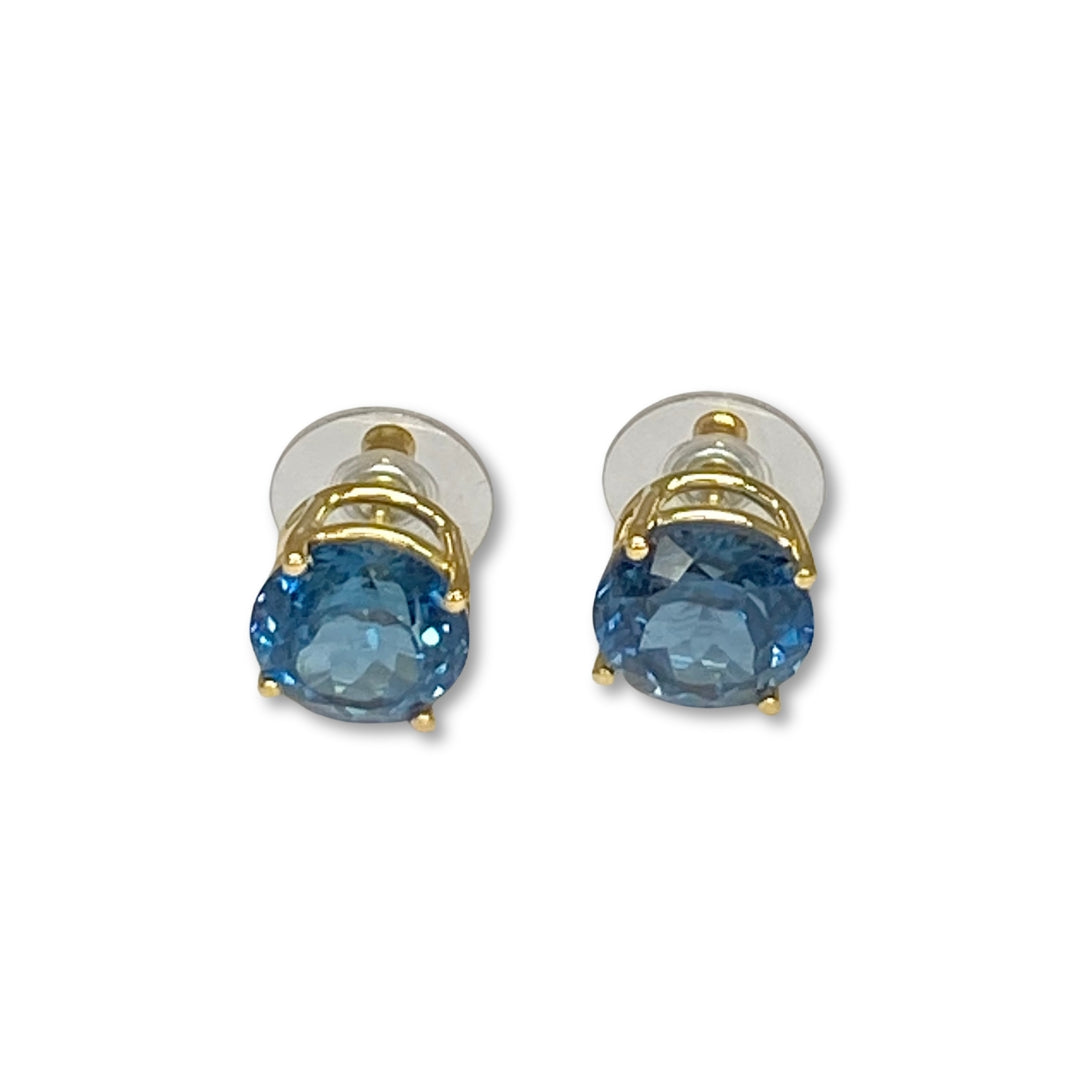 Lesunja 18K yellow gold ear studs with brilliant-cut Swiss blue topazes.