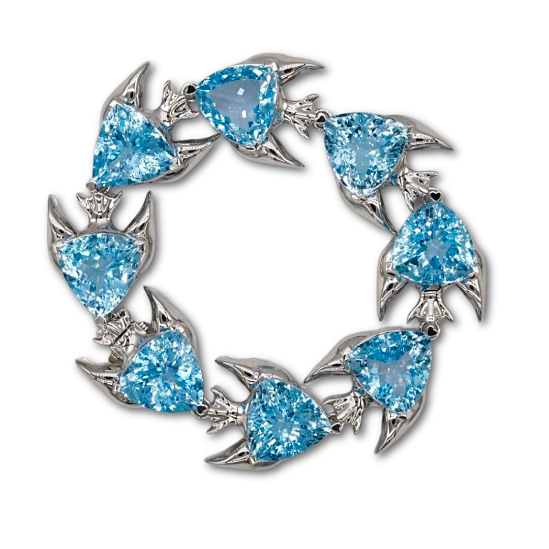 Lesunja Ocean XXY Fish Bracelet in Platinum 950 with Blue Topaz gemstones.