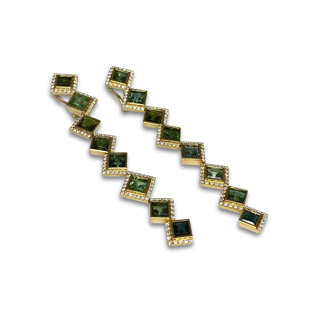 Lesunja statement earrings in yellow gold with green tourmalines and white diamonds.