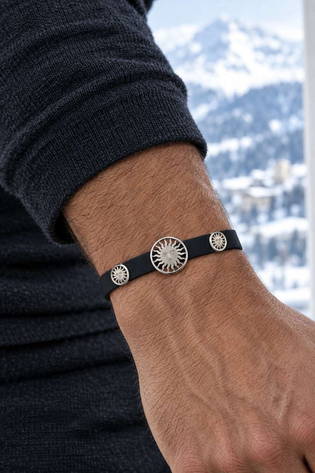 St. Moritz Sun Platin 950 bracelet with polished openwork sun worn on model