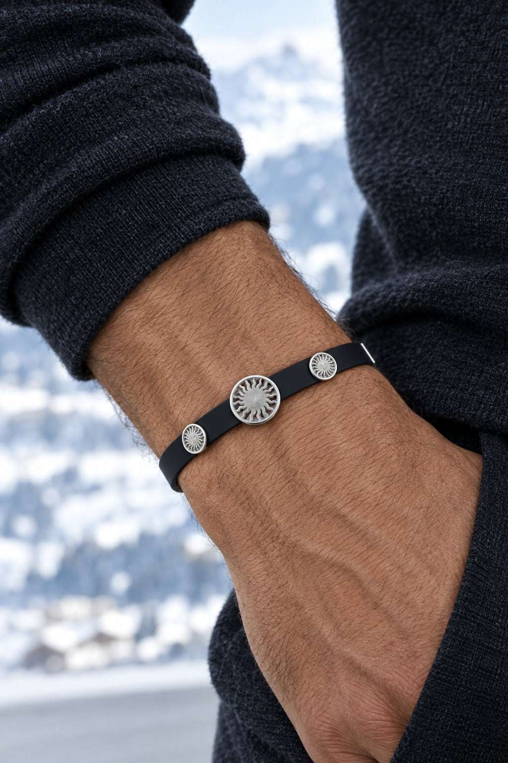 St. Moritz Sun Platin 950 bracelet with satin-brushed sun worn on model