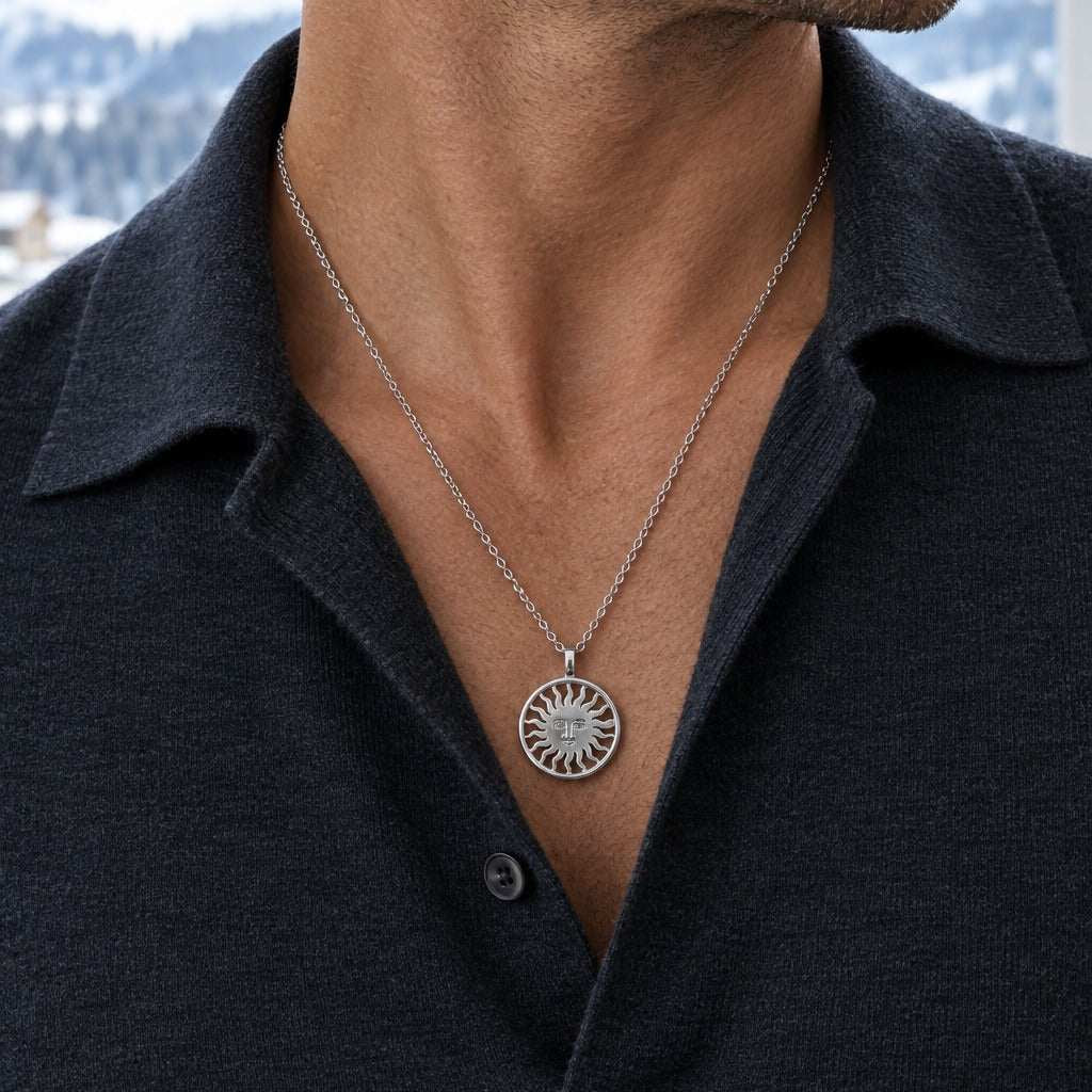 St. Moritz Sun by Lesunja - platinum 950 sun pendant 17 mm on long chain worn on model