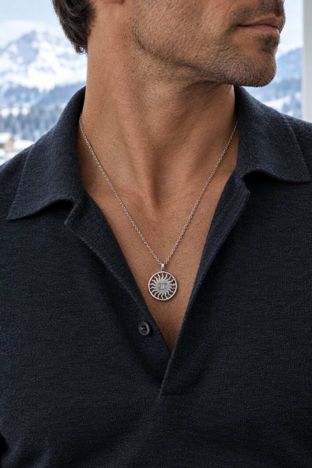 St. Moritz Sun by Lesunja - platinum 950 sun pendant 17 mm on long chain worn on model