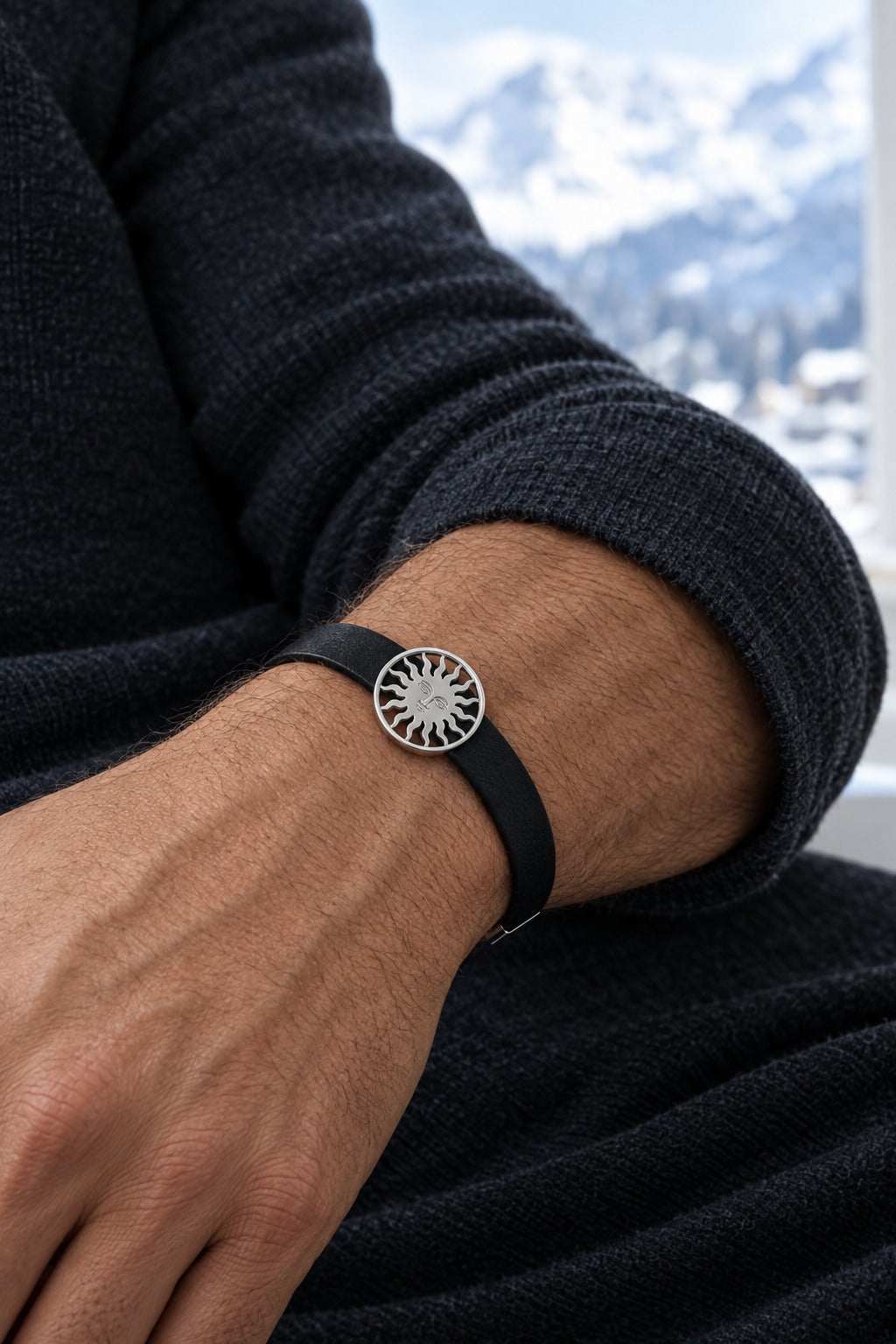 St. Moritz Sun by Lesunja - 9k white gold sun on black leather bracelet worn on model