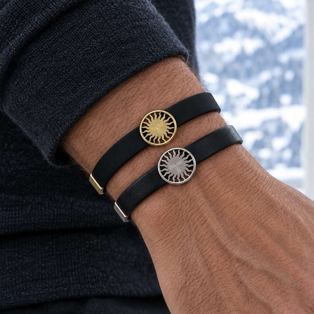 St. Moritz Sun by Lesunja - white gold and gold sun bracelets stacked on model