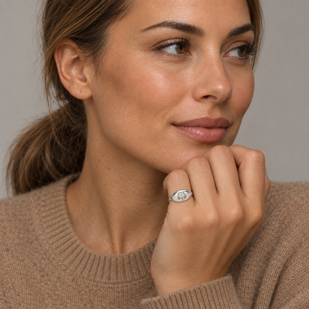 Model wearing the Lesunja Zodiac Libra Silver Ring