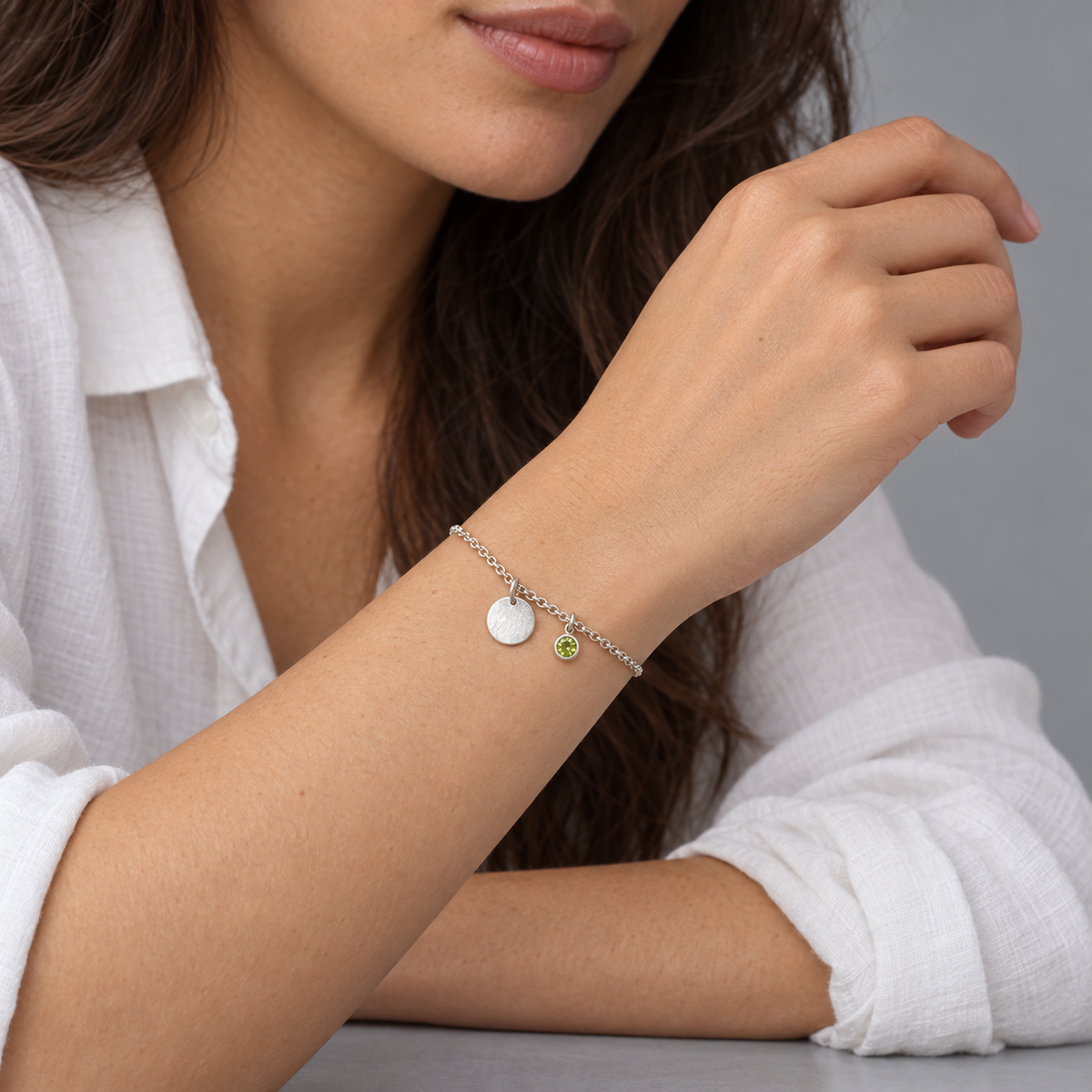 Model wearing the Lesunja Peridot Silver Bracelet