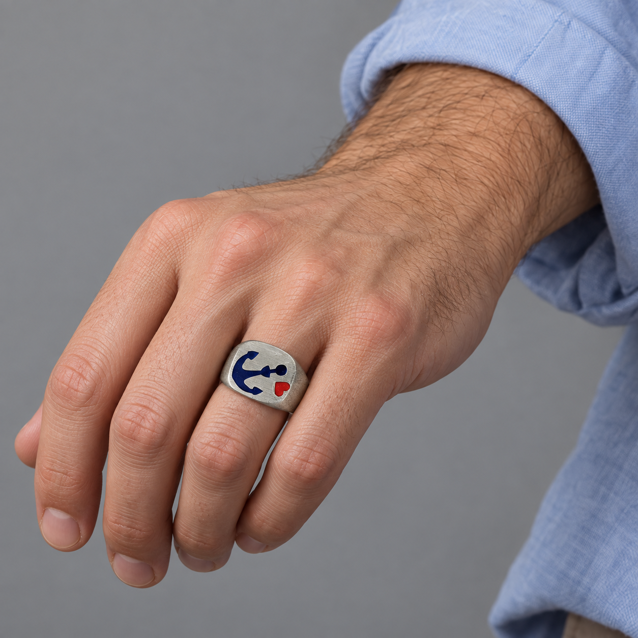 Model wearing the Lesunja Signet Ring Silver Enameled Blue Anchor & Red Heart size: 60,5