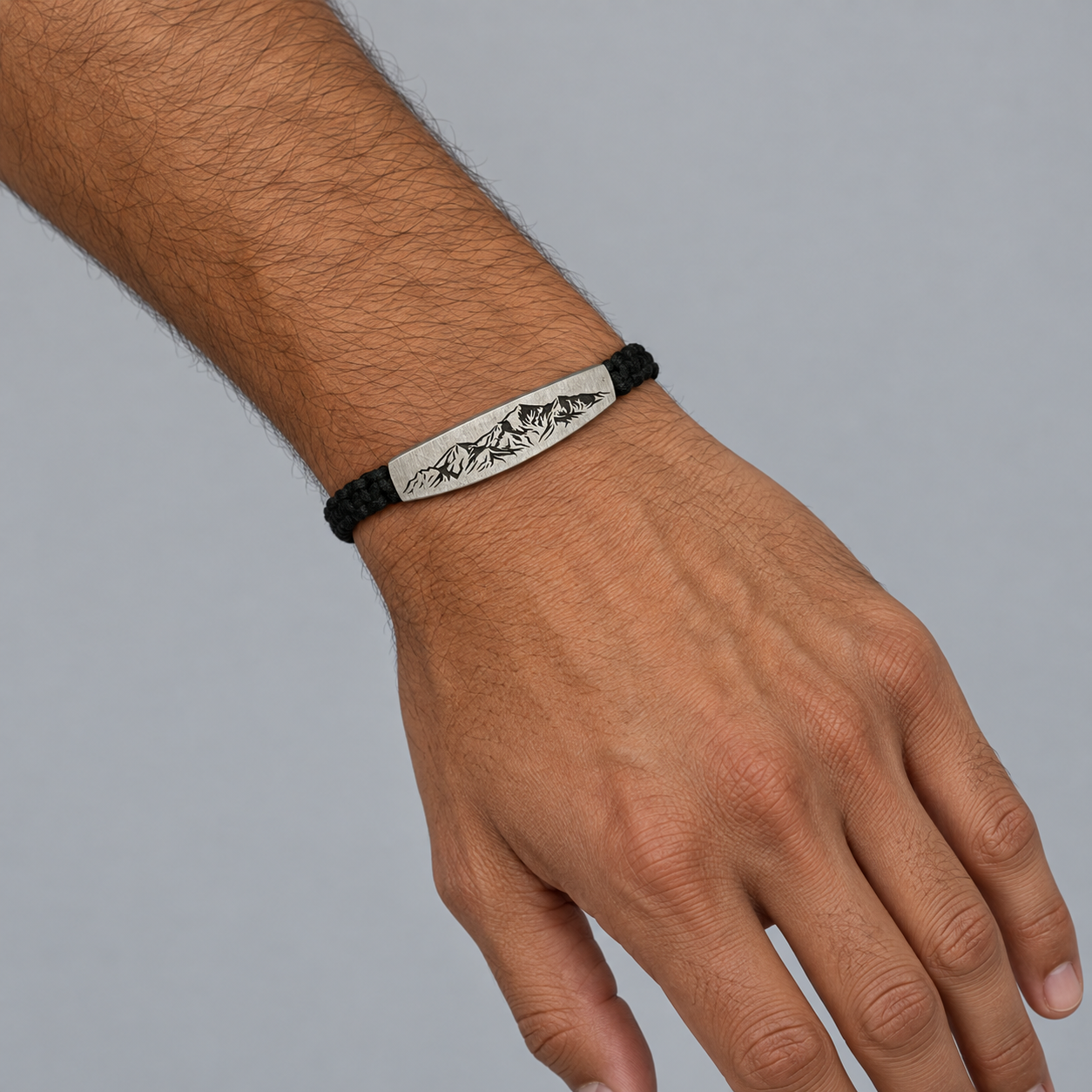 Model wearing the Lesunja Bracelet Silver Mountains from St. Moritz & Black Strings